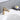 brushed gold single hole bathroom faucet installed beside soap tray