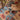 Cat laying on tribal jute rug with geometric patterns