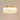 Ceiling light glowing warmly with carved inner acrylic pattern