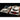 Artistic lighting highlights hand with rings and red lips ceramic trays on wood
