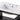 CharmyDecor 30 inch bathroom vanity with sink close-up showing the white ceramic basin, three faucet holes, and overflow opening.
