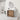 CharmyDecor 30 inch bathroom vanity with sink in a styled bathroom, angled view beneath an organic-shaped mirror
