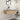CharmyDecor 36-inch floating bathroom vanity mounted above the floor in a modern bathroom with a mirror and pendant lighting