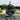 charmydecor 400 lb capacity hanging egg chair with U-base stand and thick dark gray cushions in an outdoor garden