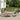 Charmydecor 4-piece outdoor conversation set with green woven loveseat and chairs around an acacia wood coffee table