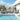 charmydecor 4-piece outdoor conversation set with swivel chair sofa club chair and sintered stone coffee table by pool