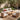 Charmydecor 4 piece patio conversation set with beige cushions in a shaded Mediterranean garden