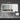 Bathroom mirror with dimensions and LED light indicators on a gray wall.