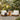 Charmydecor acacia wood outdoor chat set with oversized beige cushioned club chairs and matching side table in a gravel garden lounge area