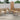 CharmyDecor acacia wood outdoor dining chairs with woven wicker backs and cream cushions arranged on a patio