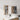 CharmyDecor bathroom mirror with cabinets in an angled room view, showing glass shelves and a towel hanging from a door hook.
