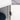 charmydecor bathroom storage cabinet close up showing metal hinge and white cabinet door