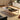 Modern coffee table in a living room setting with decorative items.
