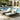 Charmydecor black acacia wood patio chaise lounges with cream cushions arranged poolside