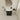 CharmyDecor black chestnut bathroom vanity viewed from above in a bathroom setting with a white curved-front sink