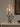 charmydecor black iron branch candle holder with five taper candles on linen table