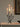 charmydecor black iron branch candle holder with five taper candles on linen table