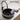 CharmyDecor black vessel sink shown with a hand wiping the rim and basin with a blue cloth