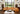 Brown leather sectional with recliner in luxury living room with large window and modern decor charmdecor leather sectional with recliner