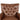 Brown leather armchair with tufted backrest on a white background
