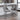 CharmyDecor chrome counter stool lifestyle scene at modern kitchen island with wine and table setting ambiance