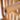 charmydecor close up of acacia wood chair leg with adjustable foot glide for outdoor dining chair