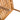 charmydecor close up of acacia wood outdoor chair leg with protective foot cap and slatted seat detail