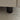 charmydecor close up of black sofa leg and white sand upholstery on modular sectional couch