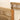 charmydecor close up of woven rope arm and beige cushion on acacia wood outdoor dining chair