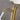charmydecor close up view of brushed gold stainless steel faucet spout with running water