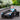 Charmydecor electric Lamborghini kid car outdoor lifestyle image child driving black ride-on sports car in park