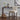 Charmydecor fabric counter stool in beige tufted design styled in modern kitchen with wine bottles and decor