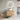 CharmyDecor floating bathroom vanity with oak-look doors and a white vessel sink in a styled bathroom