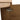 CharmyDecor floating bathroom vanity with sink, close-up of a metal door hinge against the oak-look cabinet surface.
