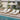 Charmydecor four outdoor acacia wood chaise lounges with cream cushions arranged poolside