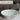 CharmyDecor freestanding solid surface bathtub water-filled oval basin in a bathroom comparison scene with text overlays.