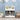 charmydecor front view kids bookshelf in blue room with three gray fabric bins