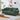 charmydecor green chenille upholstered sofa angled view with pillows and nailhead details