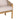 charmydecor Grotta acacia wood outdoor chair close up showing cream cushion beige rope side panel and rounded teak finish arm