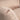 Close up cushion stitching detail Charmydecor hanging egg chair with stand 2 person beige fabric texture soft padding