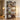 Decorative shelf with books, vases, and other items in a home setting