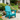 Charmydecor lake blue HDPE Adirondack chair styled in a colorful garden patio setting