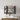 CharmyDecor large mirrored medicine cabinet open above a vanity, showing shelves stocked with towels and toiletries.