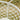 Close-up of a white rope netting with a blurred natural background