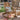 charmydecor Malibu natural acacia wood Adirondack rocking chair styled beside an outdoor pool