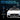 White ride-on car with Mercedes-Benz AMG branding on a dark background