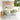 charmydecor_milan_green_iron_outdoor_dining_chairs_set_of_2_styled_on_a_modern_covered_patio_with_white_round_dining_table
