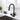 CharmyDecor modern matte black kitchen faucet installed over stainless steel sink