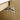 CharmyDecor oak finish bathroom vanity close-up of the soft-close door hinge.