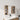 CharmyDecor bathroom mirror with storage in an angled room scene highlighting stocked open shelves beside the central mirror.
